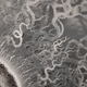 Illustration for article titled This haunting bacteria is actually an intricate hand-cut paper sculpture